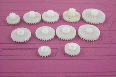 A Set of 11 Gears and Sprockets - for Electric Motors